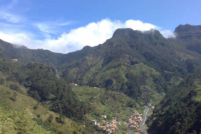 Small Group West Tour Waterfalls & Fanal Forest Tour - Ponta do Sol: sunny valley folds and banana plant views